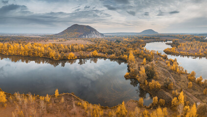 Aerial view of the popular attraction of Bashkortostan - Mount Shikhan, famous for its prehistoric deposits and numerous lakes around