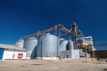 Grain elevator in Ukraine. Russia blocking shipping of wheat, seeds and corn harvest export. World crisis, starvation. Blockade of Ukrainian crops supplies