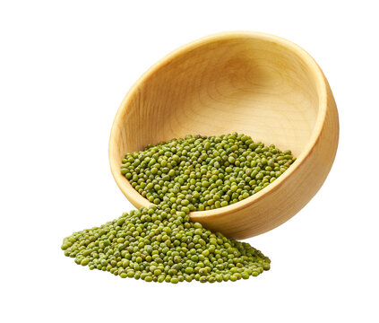 Grains mung beans are scattered out of the wooden bowl.