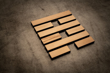 Gene Key 64 hexagram i ching wood on leather background human design