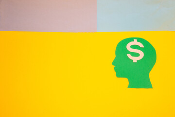 green head with dollar sign instead of brain, creative brain businessman, colorful background, making money