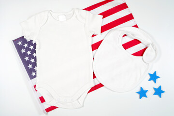 Baby Romper Onesie Bodysuit Jumpsuit and Bib Product Mockup. Patriotic Fourth of July, Independence Day theme craft product mockup styled with USA Stars and Stripes flag against a white background.