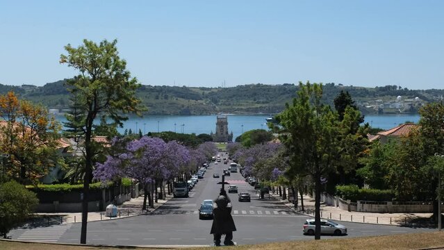 A view at Belém Tower and avenue Torre de Belém from garden Ducla Soares