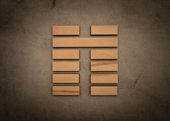 Gene Key 8 hexagram i ching wood on leather background human design