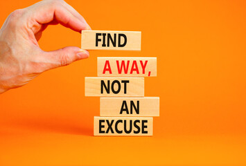 Find a way not excuse symbol. Concept words Find a way not an excuse on wooden blocks on a beautiful orange table orange background. Businessman hand. Business motivational and not excuse concept.