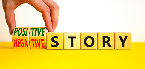 Positive or negative story symbol. Businessman turns cubes, changes concept words Negative story to Positive story. Beautiful white background. Business positive or negative story concept. Copy space.