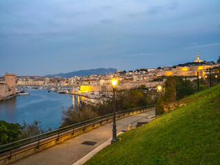 Fototapeta premium City of Marseille illuminated at dusk in the South of France