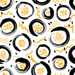 Seamless drawing with ink, hand-drawn circles. Abstract black and yellow texture. Stamp grunge blobs vector