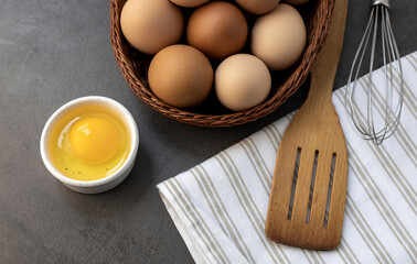 Ingredients for baking, kitchen utensils for cooking, fresh organic chicken eggs.