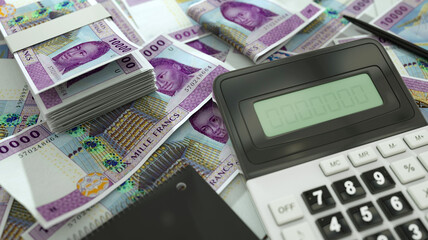 Central African cfa franc notes spread out  with a calculator, pen and notebook. 3d rendering