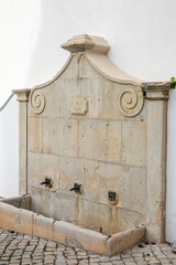 Old street water fountain