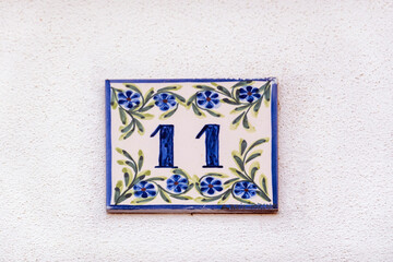 Beautiful house number eleven in azulejo