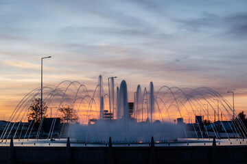 Water fountain at sunset