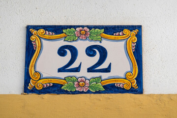 Beautiful house number twenty two in azulejo - obrazy, fototapety, plakaty