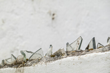 Broken glass on wall