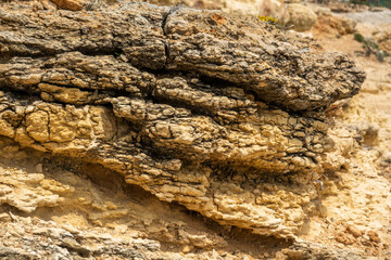 Natural sand formed by erosion of the elements