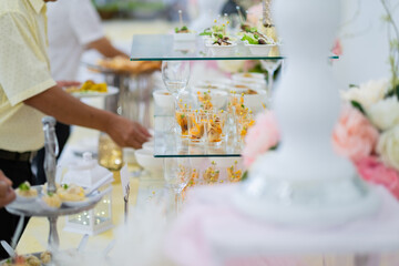 buffet food, catering food party at restaurant, mini canapes, snacks and appetizers
