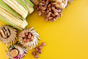 Brazilian June Party sweets, straw hat, corn, paçoca and sweet peanuts.