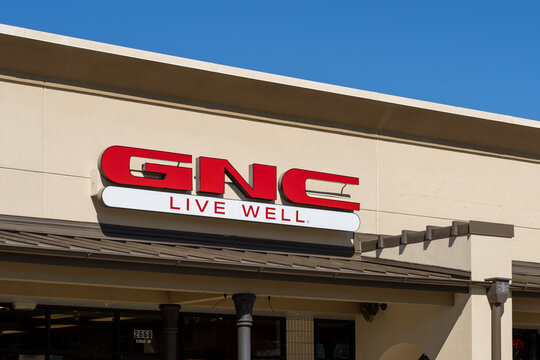 
Lafayette, Louisiana, USA - February 13, 2022: Closeup of GNC store sign on the building. GNC Holdings is a company specializing in health and nutrition related products.
