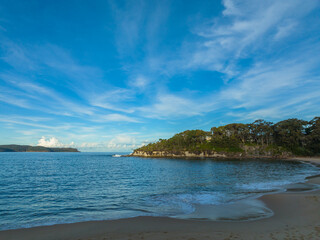 Aerial afternoon seascape with scattered high cloud