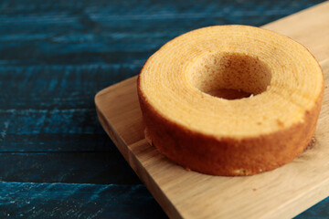 Eating Baumkuchen as a gift at a wedding ceremony at the table at tea time
 - obrazy, fototapety, plakaty