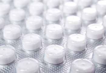 Tablets closeup background.