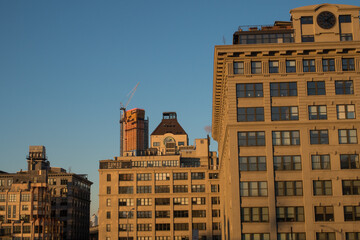 Fototapeta premium The Sun Sets and Night Falls on New York City