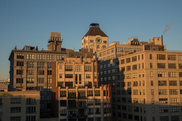 Obraz na płótnie Canvas The Sun Sets and Night Falls on New York City