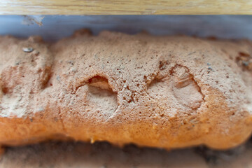 Dry old collapsing polyurethane foam close-up. Building foam quality