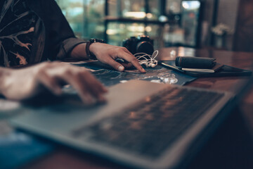 Travelers planning trips and use laptop to book hotels, buy plane tickets, search map, or find travel routes. Travel concept.