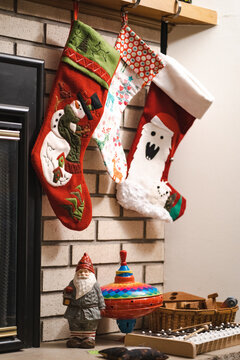 Empty Homemade Christmas Stockings Hanging Waiting For Santa