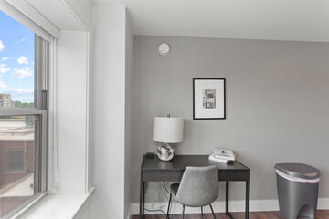 interior of bedroom with small desk