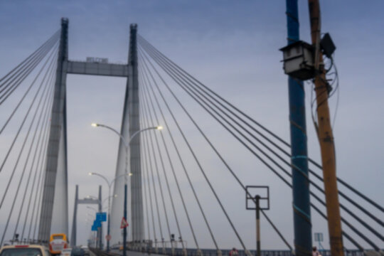 Blurred image , Image shot through car, 2nd Hoogly bridge at blue hour. Monsoon stock image.