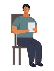 man seated with notebook