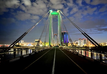 Fototapeta na wymiar bridge at night in colorful lights