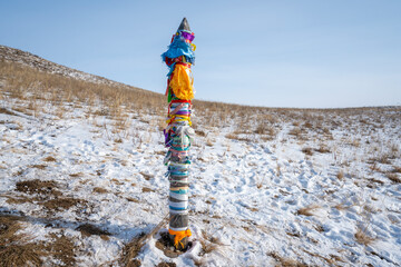 Ritual Buryat pillars on cape Shamanka, Olkhon Island in Lake Baikal