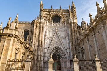 Fototapeta na wymiar Seville cathedral Giralda tower of Sevilla Andalusia Spain Church on sunny day.