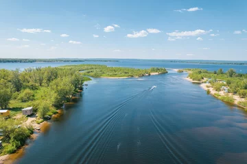 Deurstickers Aerial landscape view on Volga river with islands and green forest. Picturesque panoramic view from the height on the touristic part of the Volga river near Samara city at summer sunny day. © Quatrox Production