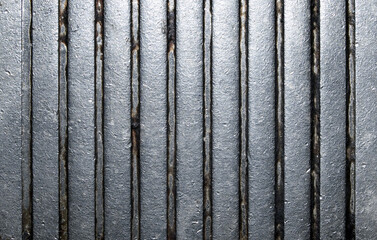Grooved metal closeup background.