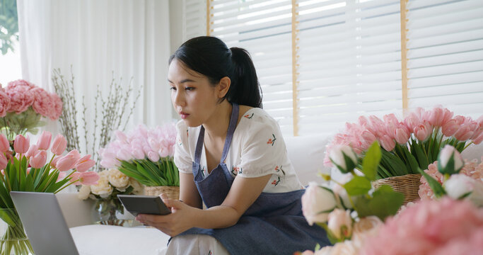 Asia People Young Woman Thoughtful Looking Away Doubtful Stress Worry In Bad News Financial Economy Recession Cash Flow Crisis In Small SME Issue Impact From Covid Coronavirus At Home Office Store.