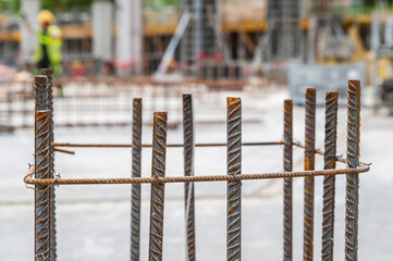 Rusty ribbed steel bars reinforcement. Reinforcing ribbed steel bar is an integral part of concrete structures. The bar will strengthen foundations, ceilings and roof tops. - 507202675