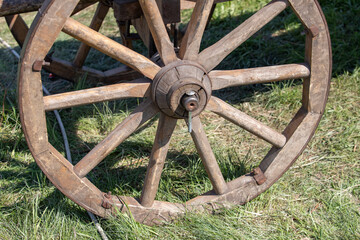 Old wooden cart with wooden wheels.