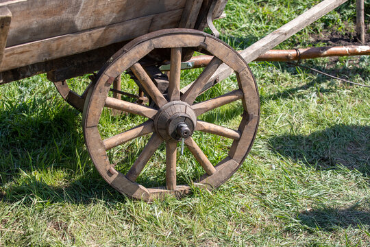 Old wooden cart with wooden wheels.