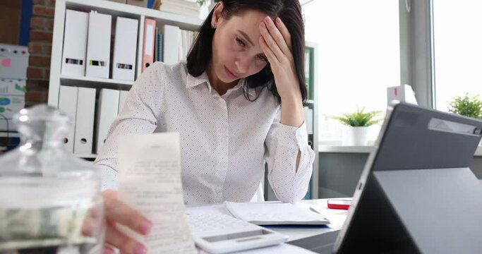 Worried office worker complains about reading bad news in paper letter