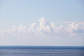 calm sea against the blue sky