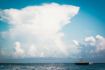 Wooden fishing boat in Akumal Bay. Paradise beach Akumal on the Caribbean coast of the Gulf of Mexico.