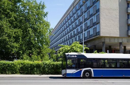MPK Krak&oacute;w public transport Solaris at the bus stop next to Hotel Orbis Cracovia, defunct hotel, currently part of the National Museum (MNK) on May 19, 2022 in Krakow, Poland.