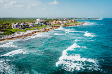Fototapeta premium Aerial view of the Akumal Bay in Quintana Roo, Mexico. Caribbean Sea, coral reef, top view. Beautiful tropical paradise beach