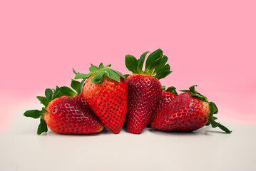 strawberry group on white and pink background