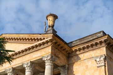 Detail of the pediment of the majestic Palace of Culture in Gagra, Abkhazia. Close-up.